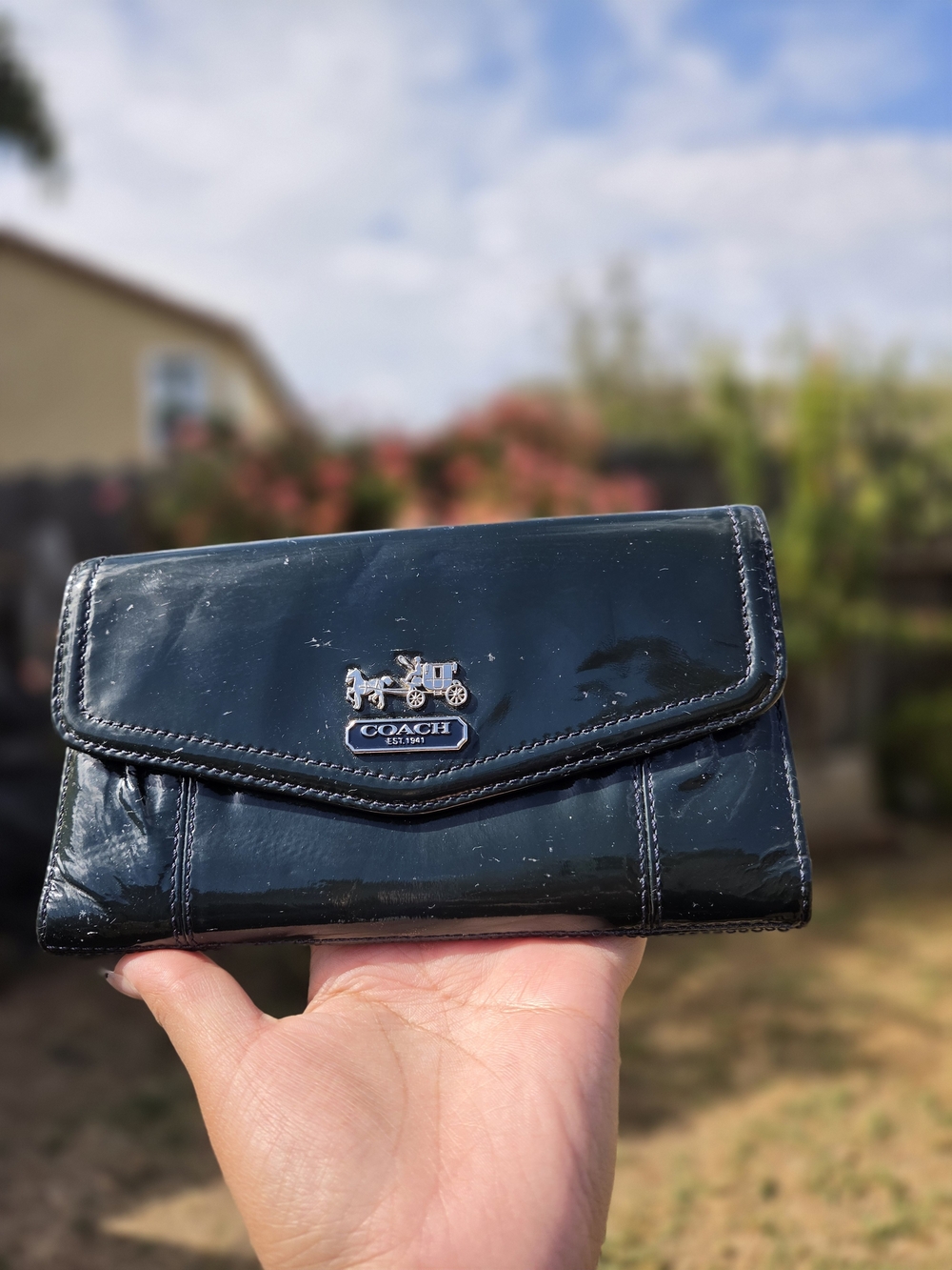 Vintage Coach navy Blue leather Madison clutch wallet featuring silver-tone
